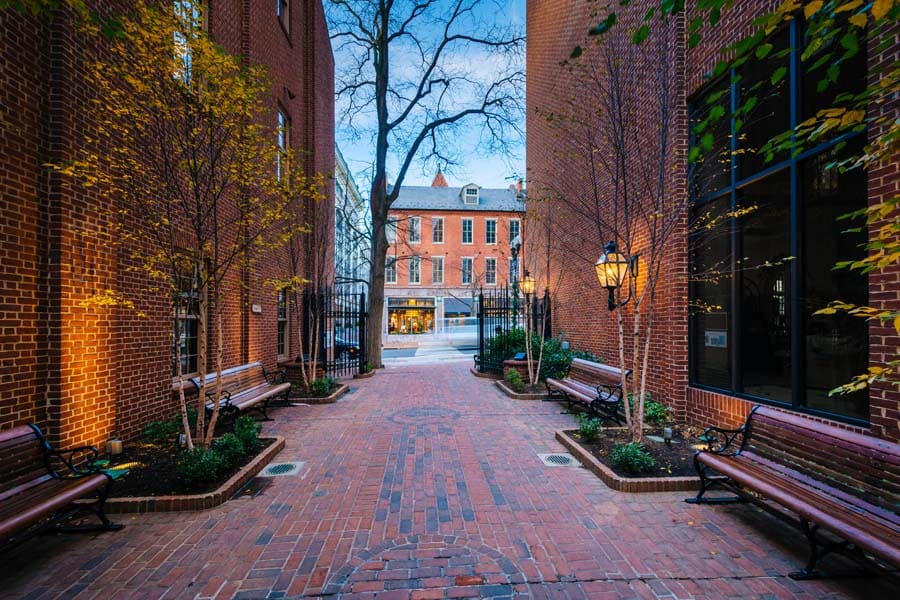 About Our Agency - Lancaster Side Street at Dusk with Modern Uplighting on the Buildings